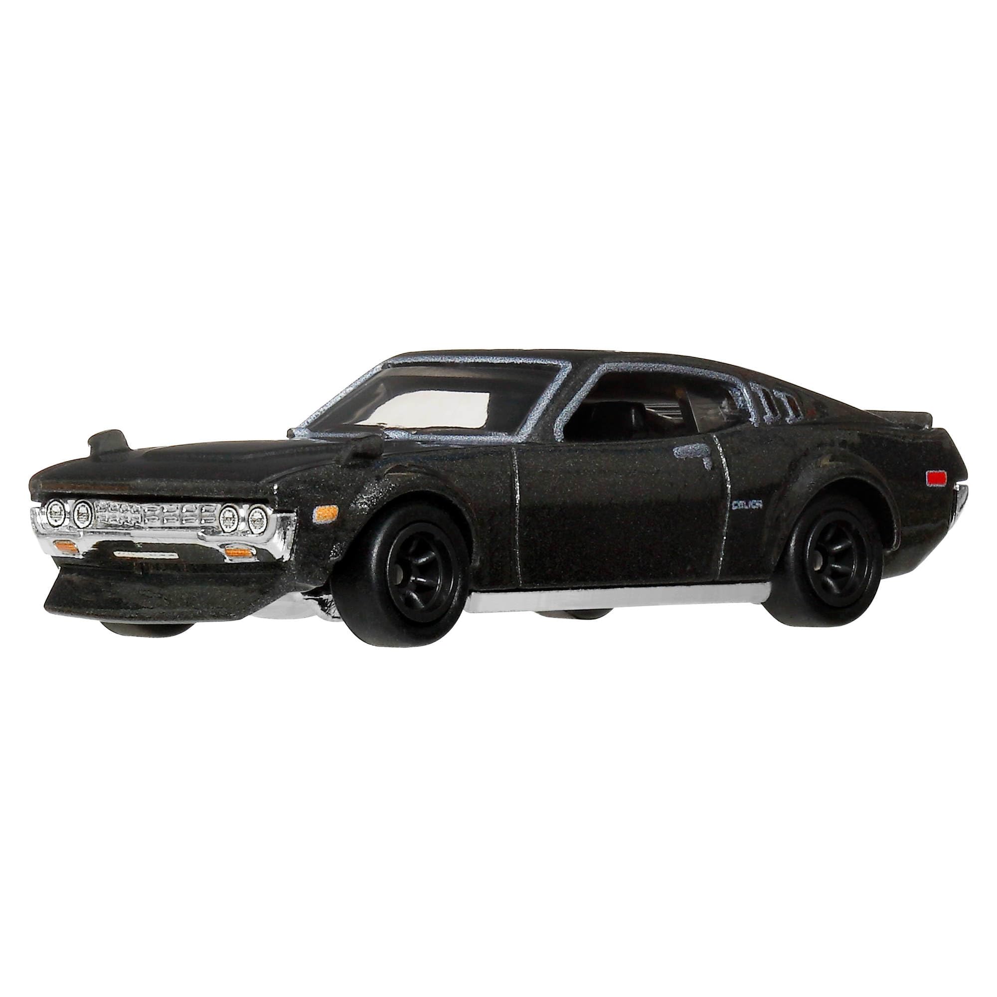 Hot Wheels Premium Car Culture - 1977 Toyota Celica RA28, modellino da collezione in scala 1:64 con dettagli realistici, telaio in metallo e pneumatici Real Riders, 3+ anni, JKD98
